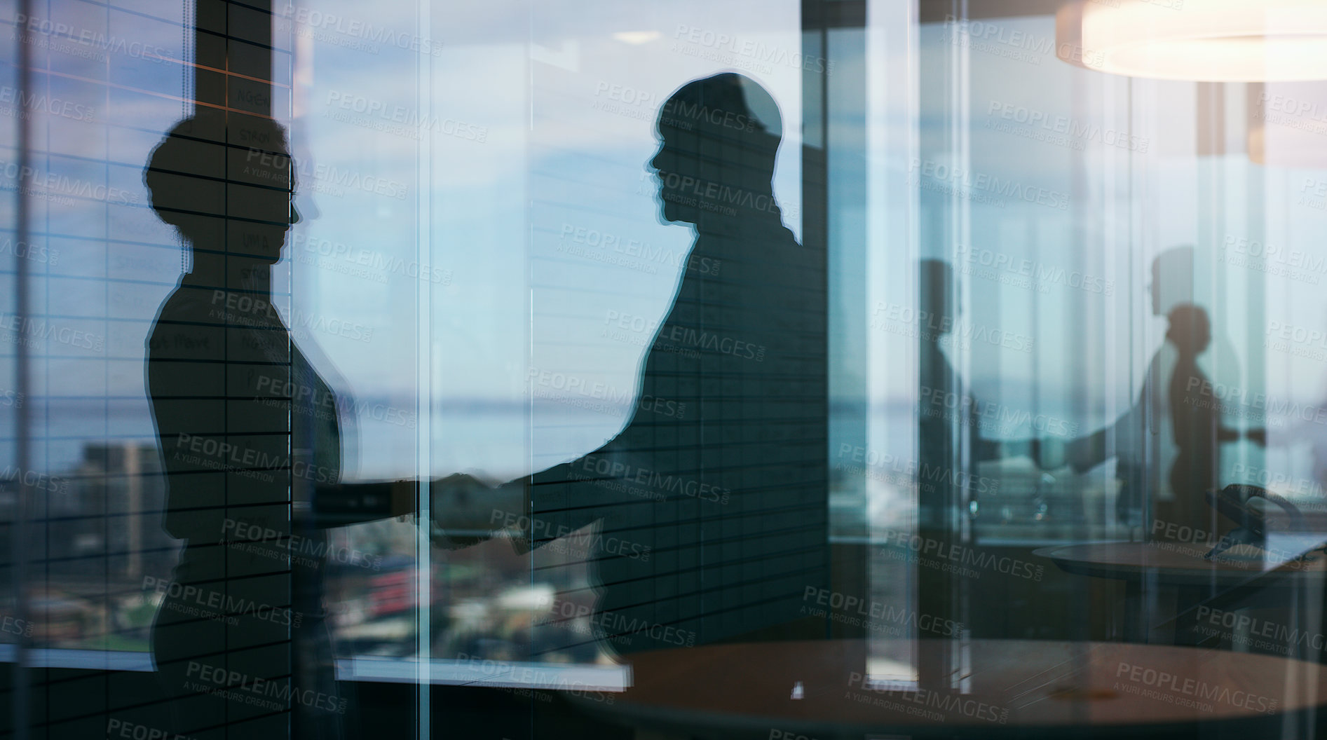 Buy stock photo Silhouette, business and people with handshake in office for promotion, performance goals and offer. Window, HR manager and employee shaking hands for department onboarding, career growth and welcome