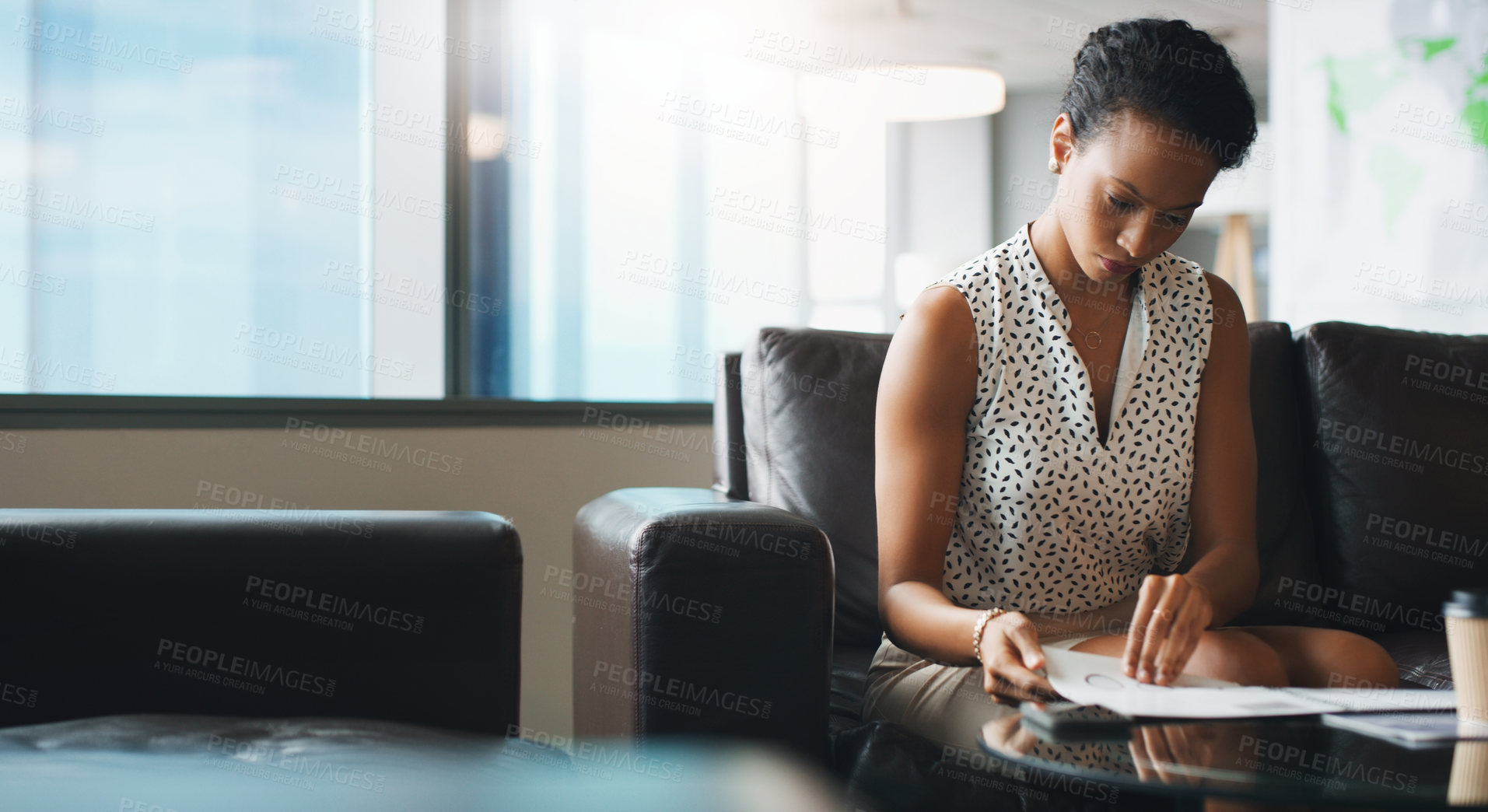 Buy stock photo Shot of a businesswoman working in a modern office