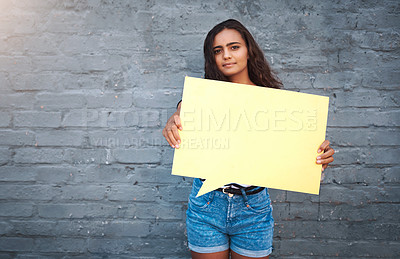 Buy stock photo Brick, wall and girl with speech bubble, smile and opinion for promotion, marketing and announcement. Portrait, outdoor and person with mockup, advertising and discount or deal in store and USA