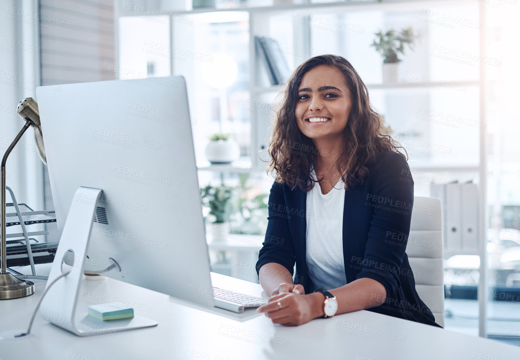 Buy stock photo Computer, woman and desk for online work, smile and portrait on internet in workspace. Technology, employee and creative for freelancer web designer, research and editing for agency or business