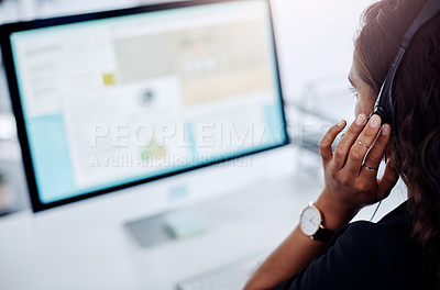 Buy stock photo Woman, consultant and call center with headphones for tech support, customer service or online advice at office. Rear view of female person or agent with mic on computer for web, help, or assistance