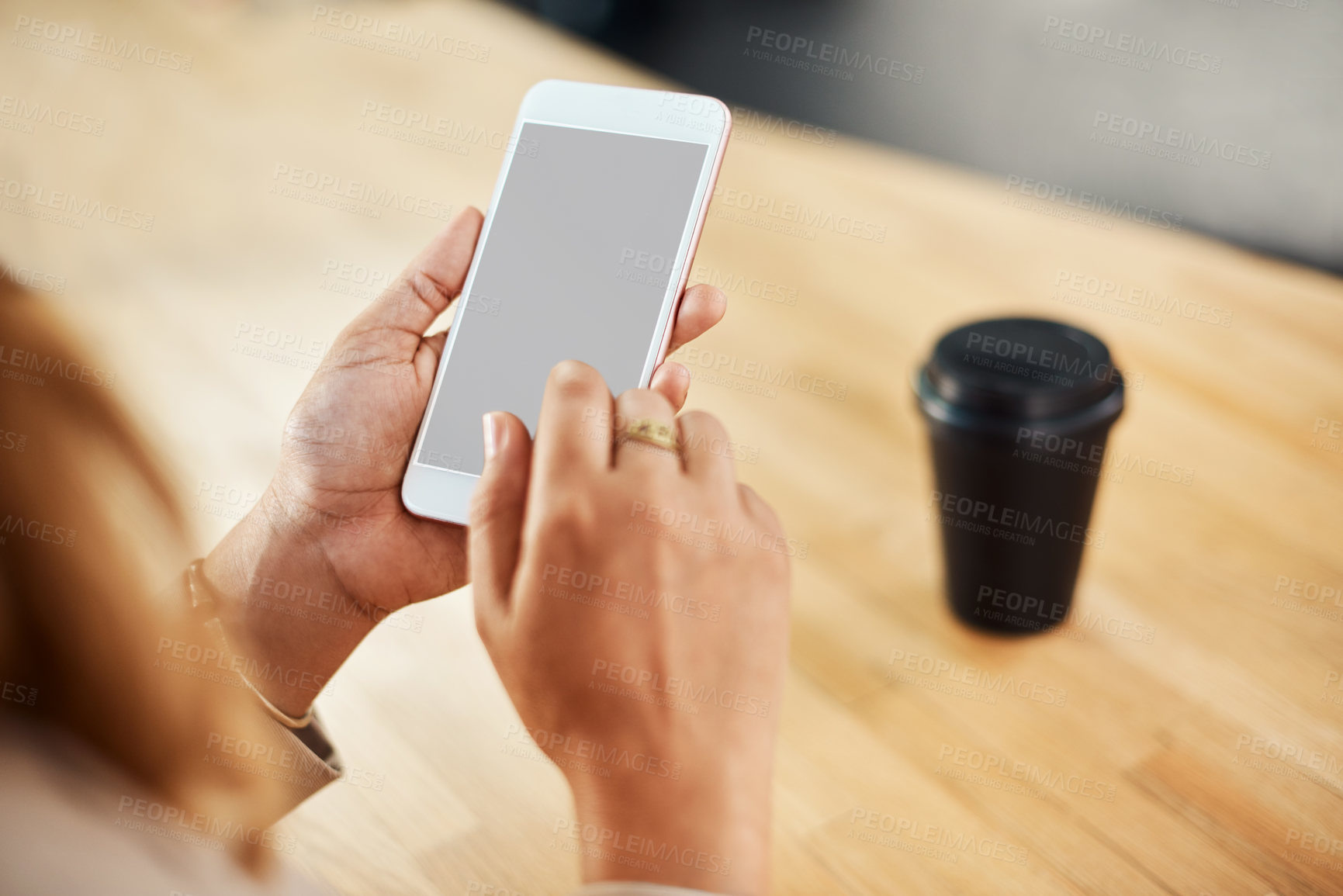 Buy stock photo Smartphone, screen and hands of person on table, scroll and chat with online contact by mockup. Office, employee and cellphone with mobile app for connection, networking and text message to client