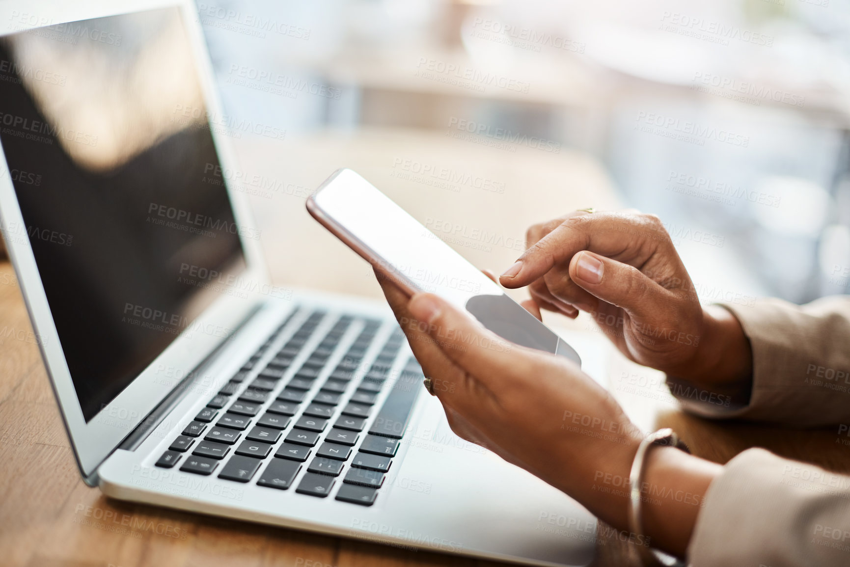 Buy stock photo Hands, laptop and phone with business person at desk of office for email, feedback or report. Computer, mobile and research with corporate employee in professional workplace for communication