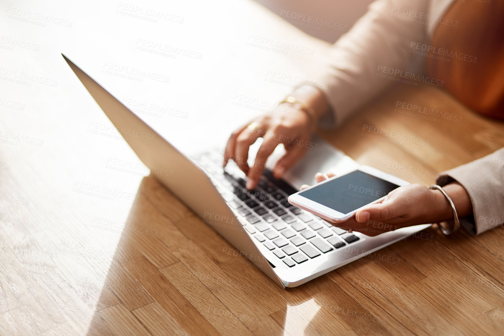 Buy stock photo Hands, laptop and phone with person at desk of office for business flight booking or confirmation. Computer, email and keyboard with corporate employee in professional workplace for communication