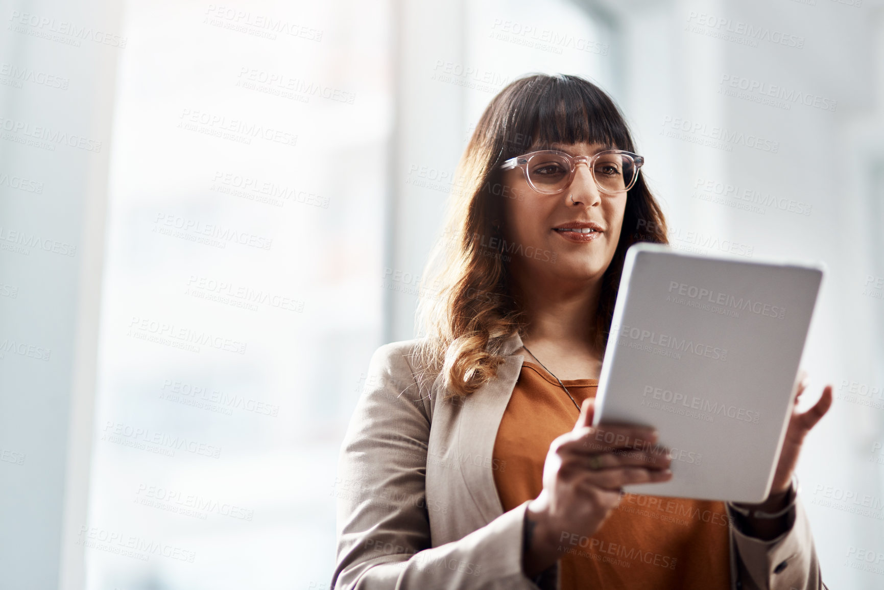 Buy stock photo Tablet, reading and businesswoman in office for creative project for international public relations client. Happy, digital technology and female communications director with email for media report.