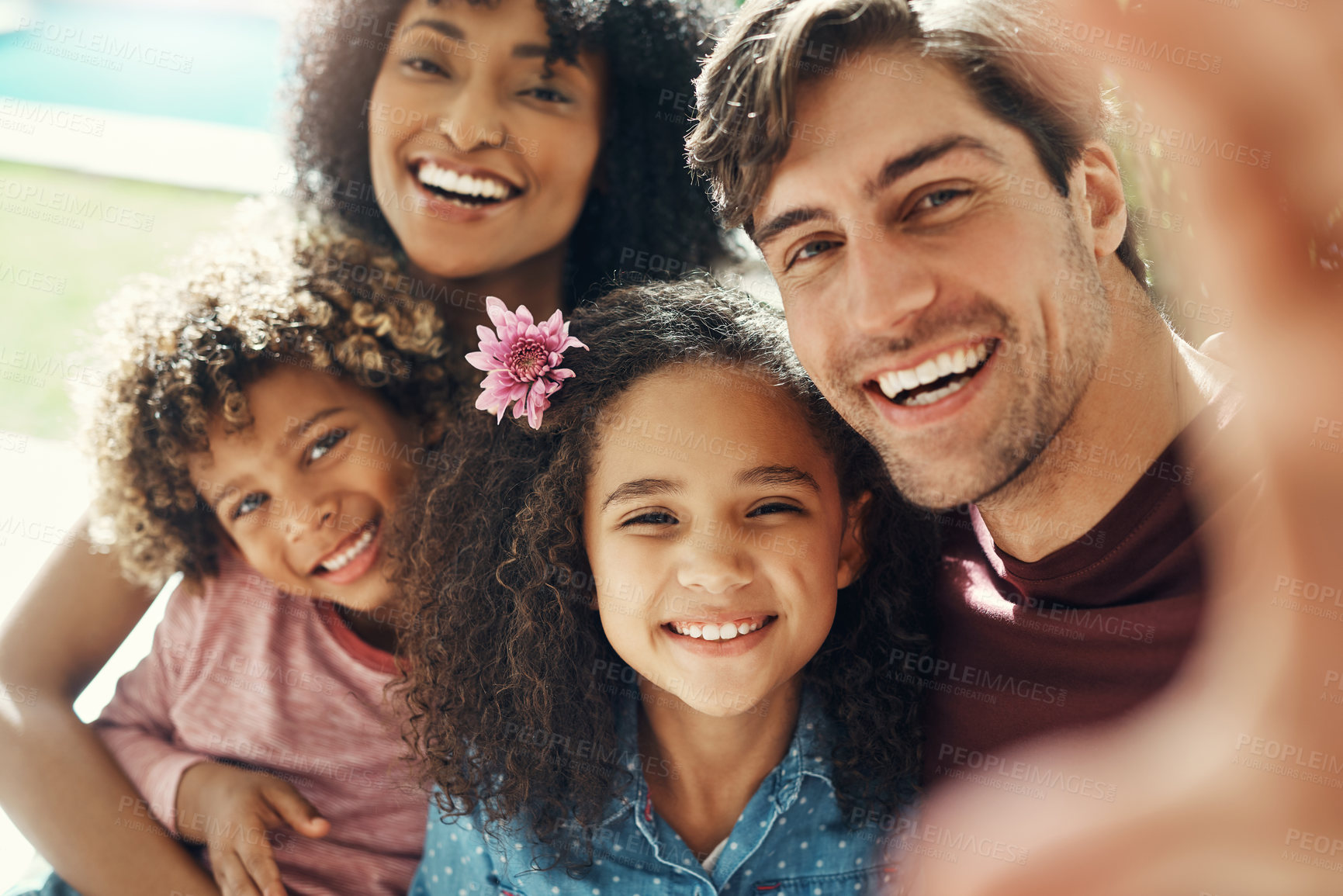 Buy stock photo Selfie, smile and parents with kids for outdoor fun, love and interracial family in backyard at home. Mom, dad and children in garden together for bonding with digital photography, support or memory