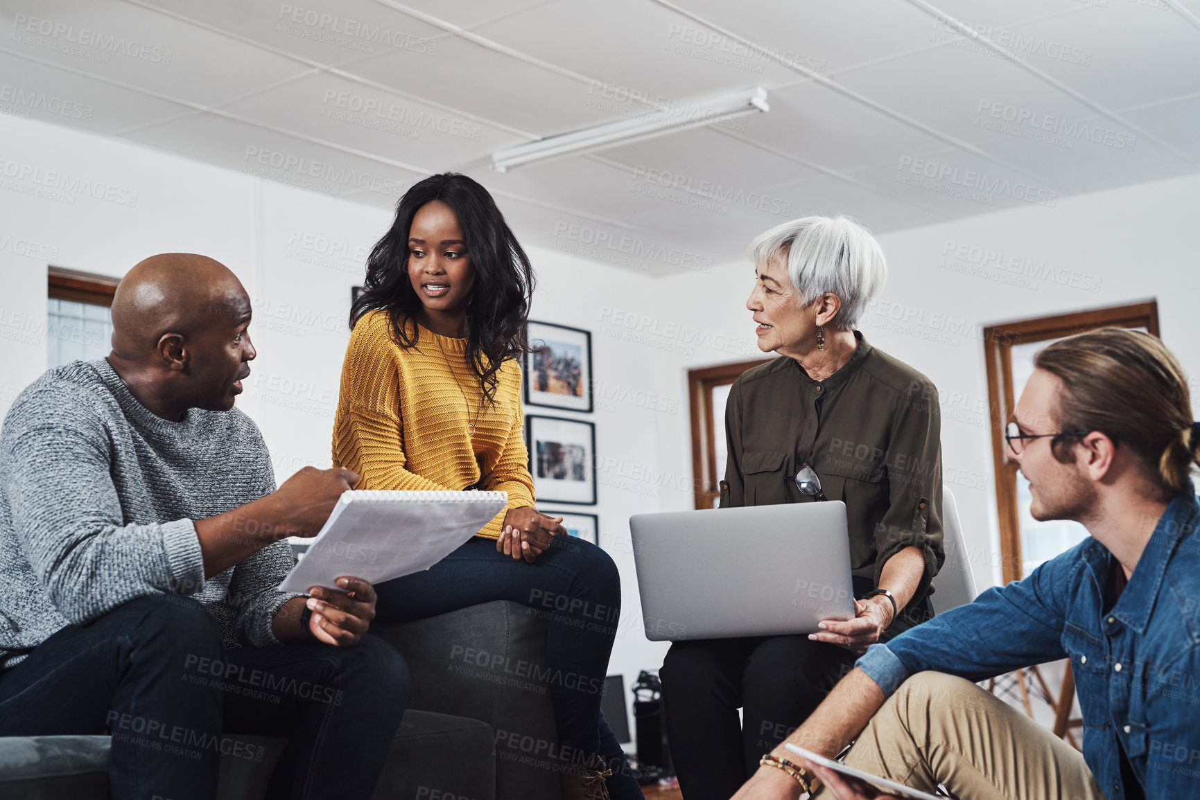 Buy stock photo Meeting, laptop and business people in office with documents, project development or teamwork. Discussion, diversity and staff with planning for collaboration, conversation or review at travel agency