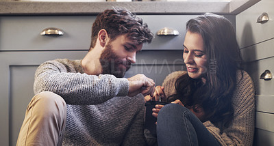 Buy stock photo Ice cream, relax and couple on floor in kitchen for bonding, relaxing and quality time together. Love, relationship and man and woman sharing sweet treats, dessert and luxury snack for romance date