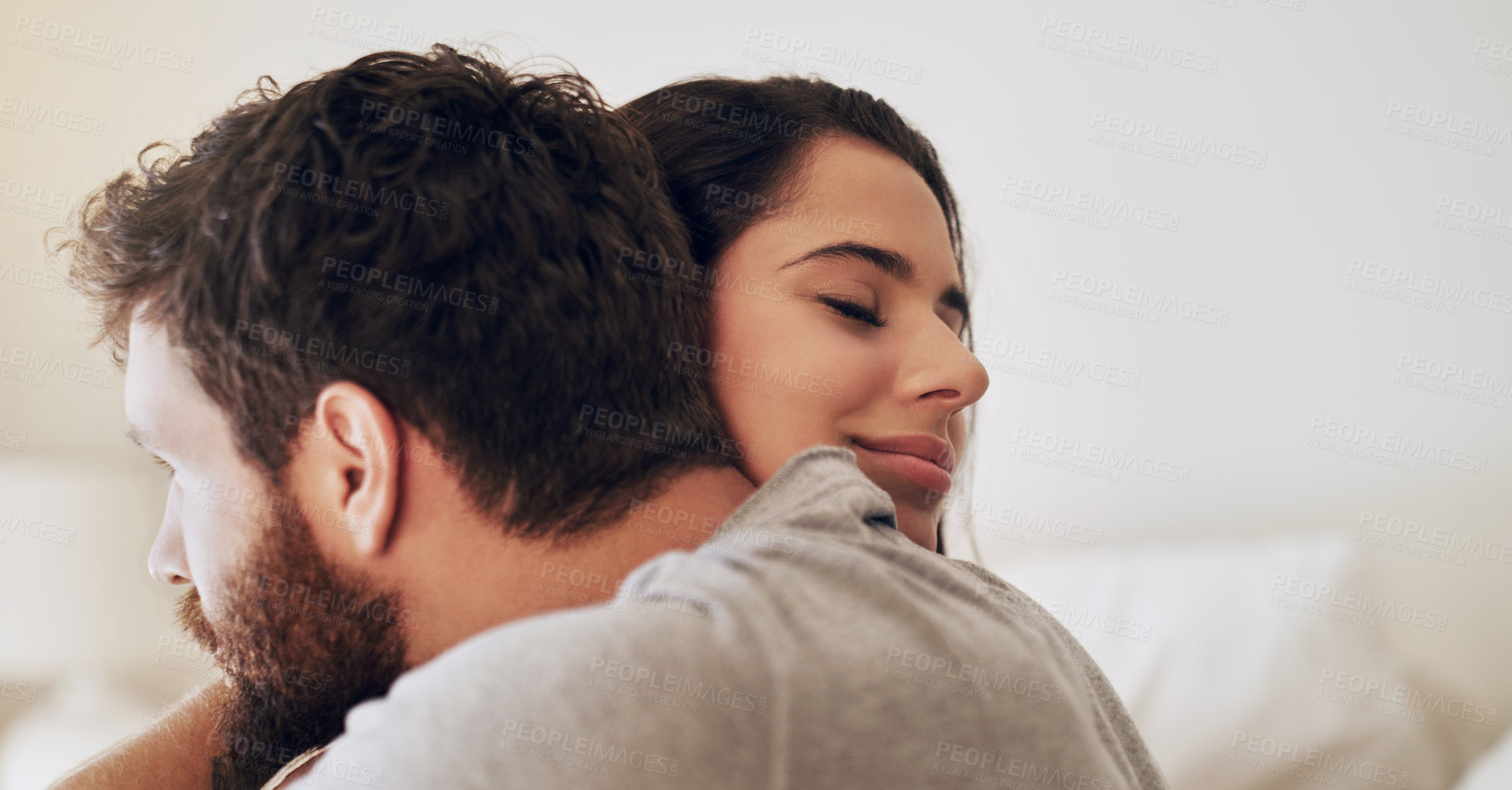 Buy stock photo Couple, people and home with hug in bedroom in smile,  together and support with affection. Relationship, happy and bonding for romance with commitment for care, help and trust as soulmate for love