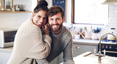 Buy stock photo Shot of a happy young man couple spending a relaxing day at home