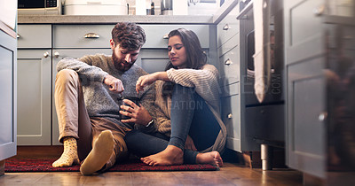 Buy stock photo Ice cream, love and couple on kitchen floor for bonding, relax and quality time together at home. Dating, relationship and happy man and woman with sweet food, dessert and marriage with romance