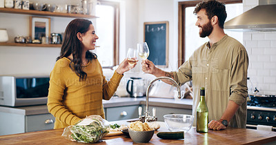 Buy stock photo Happy couple, champagne and cheers in kitchen for anniversary, date or celebration together at home. Man and woman in relationship with alcohol or win for valentines day, love or toast at the house