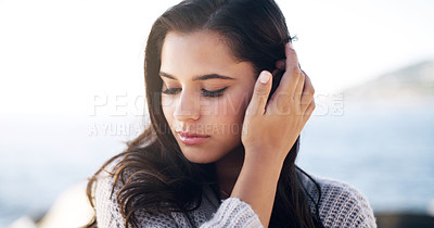 Buy stock photo Cropped shot of a beautiful young woman spending time outdoors