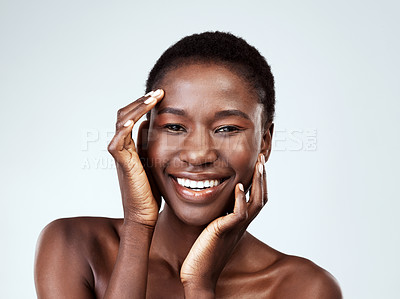 Buy stock photo Skincare, portrait and black woman in studio, natural and treatment for glow of skin, beauty and wellness. White background, hands and results of dermatology for face, smooth and happy with cosmetics