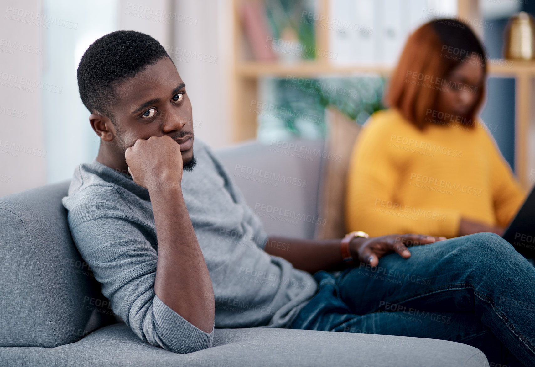 Buy stock photo Divorce, fight and angry black couple on sofa with stress, dispute or argument in their home. Marriage, conflict and African man frustrated, overthinking or ignore liar wife in living room with doubt