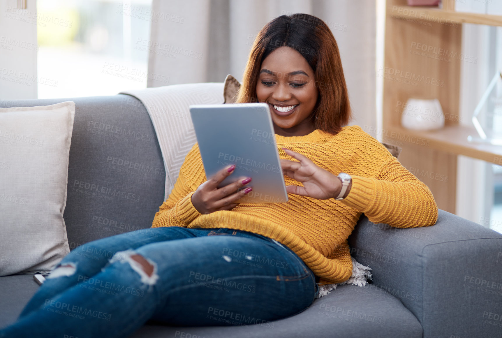 Buy stock photo Tablet, search and happy black woman on sofa with social media, reading or website scroll at home. Digital, research or student with streaming app for sign up, online course or elearning registration