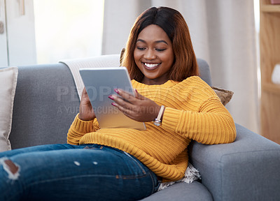 Buy stock photo Tablet, ebook and happy black woman on sofa with social media, reading or website scroll at home. Digital, research or student with streaming app for sign up, online course or elearning registration