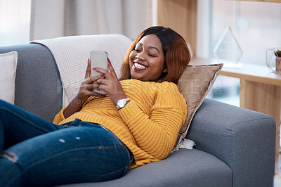 Buy stock photo Relax, phone and happy black woman on sofa with internet, search or online dating chat at home. Smartphone, smile or social media in living room for streaming app for sign up, service or subscription