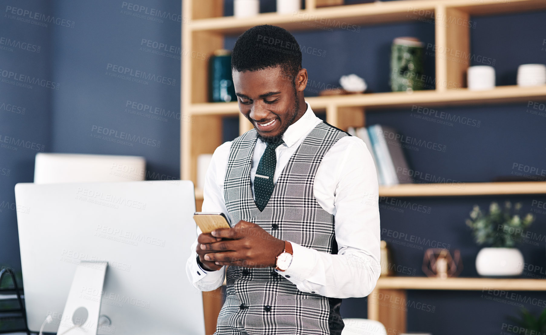 Buy stock photo Smile, typing and black man in office with phone for online research, email and communication at law firm. Corporate, attorney and networking with digital technology for policy review or legal case