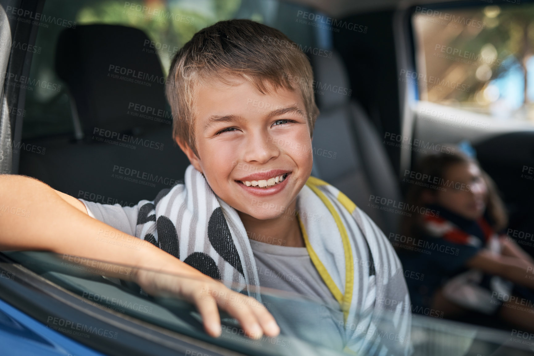 Buy stock photo Cropped portrait of a young boy sitting in the car before going on a roadtrip with his family