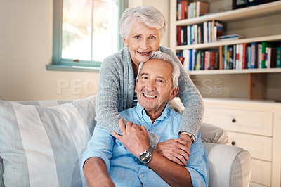 Buy stock photo Shot of a senior couple spending quality time at home
