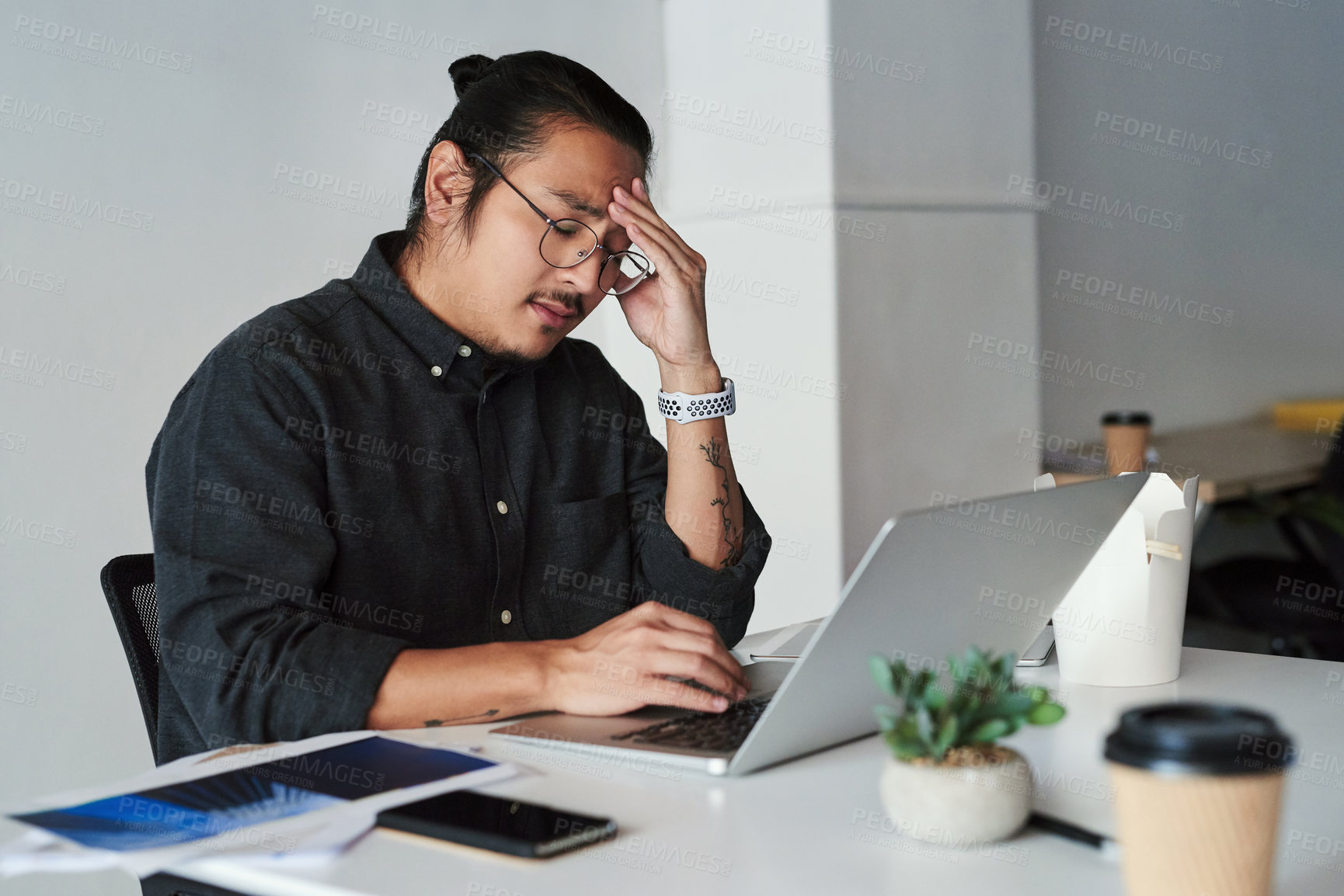 Buy stock photo Asian man, headache and laptop glitch in office, stress and 404 error or burnout for bankruptcy. Male person, glasses and frustrated for proposal or project, depression and anxiety for business