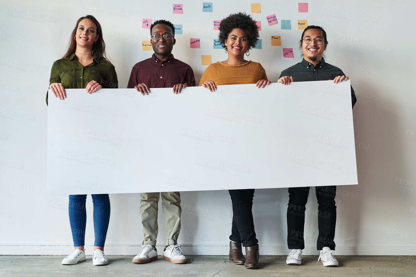 Buy stock photo Employees, portrait and sign poster in office, creative teamwork and placard for promotion banner. Business people, mockup space and collaboration on paper, support and solidarity for diversity