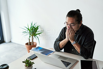 Buy stock photo Stress, headache and business man on laptop with fatigue, sick or pain in startup office. Migraine, tired and creative worker exhausted with work project, burnout and massage nose bridge for overwork