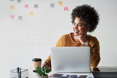 Buy stock photo Shot of an attractive young businesswoman feeling cheerful while working in her office