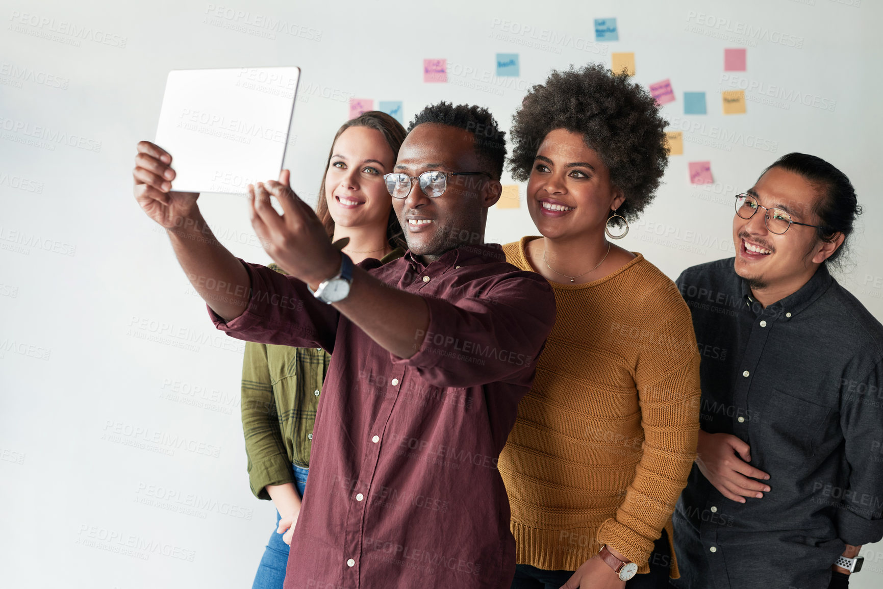 Buy stock photo Selfie, friends and happy business people on tablet in office for diversity, picture and memory together. Creative, photography and group smile in startup for team building, solidarity and coworking