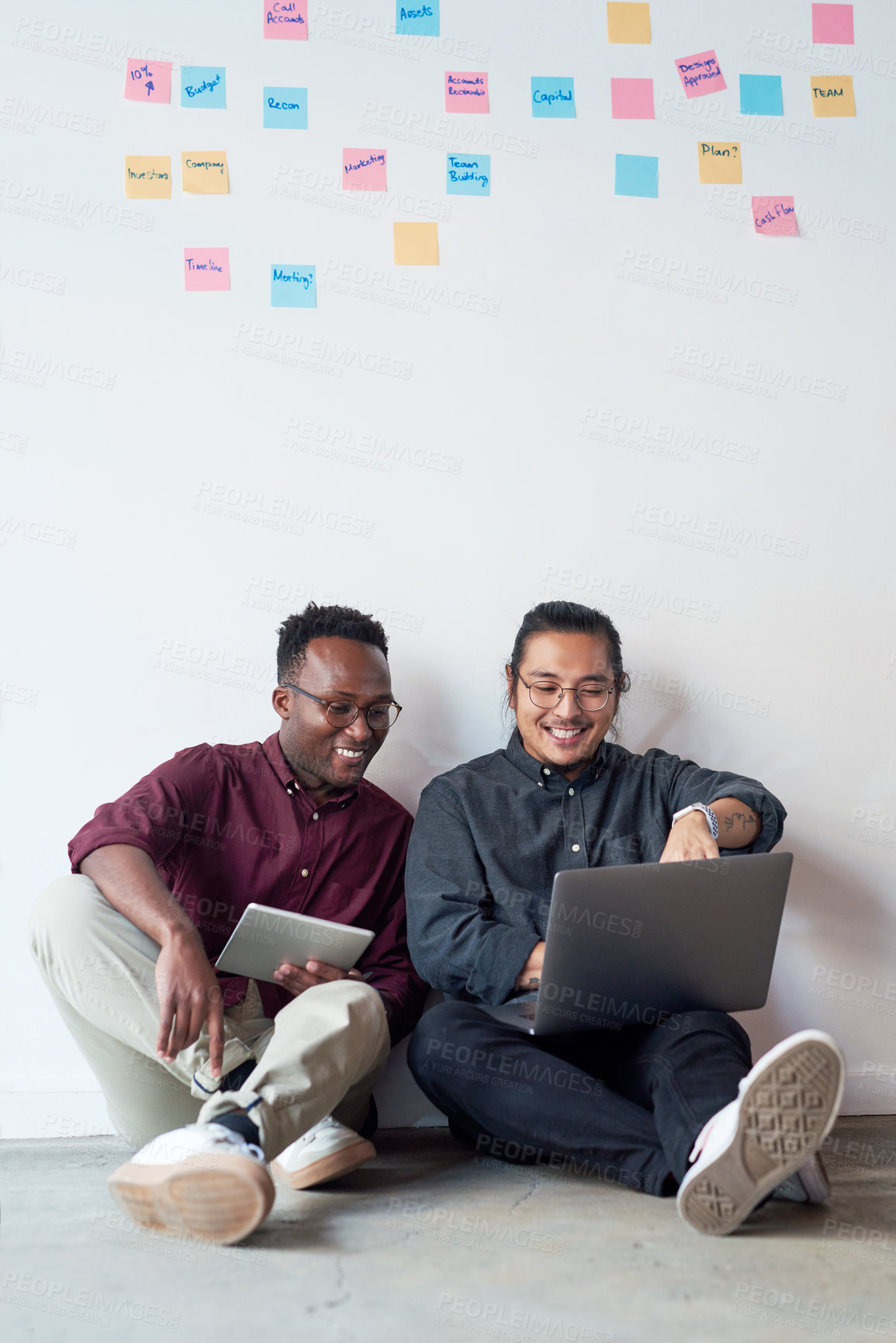 Buy stock photo Business people, laptop and men on floor, creative agency and planning for project. Coworkers, startup and employees with tablet, cooperation or feedback for publishing industry, research or teamwork