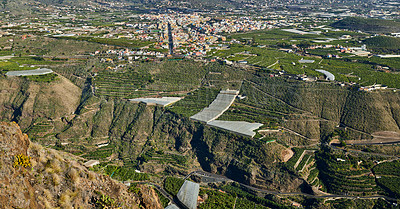 Buy stock photo Copyspace landscape view of banana plantations around Los Llanos, La Palma in Spain. Remote fields and farmland on the countryside from above. Secluded mountains in a deserted area with copy space