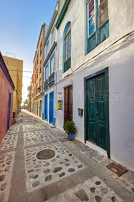 Buy stock photo City view of residential houses or buildings in quiet alleyway street in Santa Cruz, La Palma, Spain. Historical spanish and colonial architecture in a tropical village and famous tourism destination