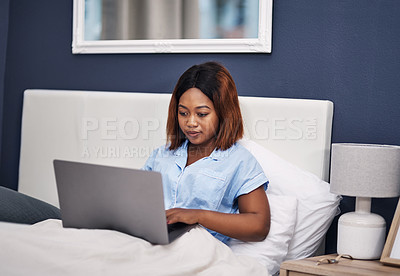 Buy stock photo Black woman, laptop and bed relax in home for movie streaming as film entertainment, watching or pajamas. Female person, internet and comfortable with duvet in house for evening, resting or online