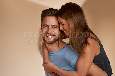 Buy stock photo Portrait, smile and love of couple in home together for bonding, piggyback and laughing on mockup space. Face, happy man and woman hug for healthy relationship, support and connection in apartment