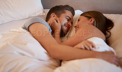 Buy stock photo Peace, love and couple hug in bed with safety, security or comfort in bonding at home together. Wake up, relax or calm people in bedroom with conversation, romance or resting on lazy morning in house