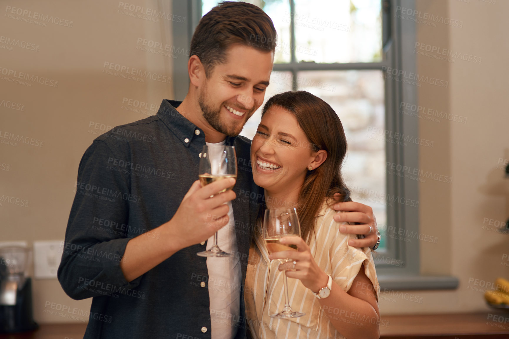 Buy stock photo Wine, toast and happy couple in a house with love, trust or celebration for birthday, anniversary or good news. Champagne, cheers or people in home party for real estate, success or investment growth