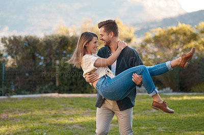 Buy stock photo Happy couple, carry and outdoor park for relax date or exploring nature with romance, love or bonding. Man, woman and smile on summer vacation for celebrating anniversary in forest, care or together