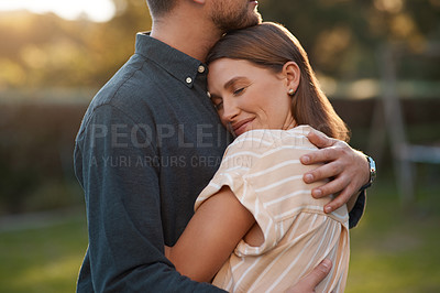 Buy stock photo Couple, hug and happy in garden park for relationship support or comfort, embrace or partnership. Man, woman and happiness at sunset for honeymoon travel in Australia with peaceful calm, love or date