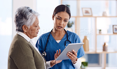 Buy stock photo Telehealth, senior woman or doctor with digital tablet, consultation or planning treatment for cure. Female person, employee or medical professional with a patient, women or technology for healthcare