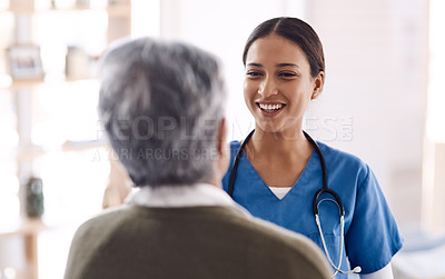 Buy stock photo Healthcare, happy and a nurse talking to an old woman about treatment in a nursing home facility. Medical, smile and a female medicine professional chatting to a senior resident during a visit