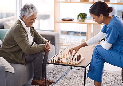 Buy stock photo Women, chess and nurse with a senior patient, retirement home and happiness with healthcare. Female person, medical professional and mature lady with employee, nursing and care with games and relax