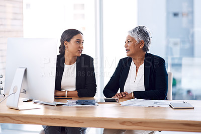 Buy stock photo Mentor, collaboration or business women with computer talking, speaking or planning a project in office. Technology, teamwork or senior manager with female intern for strategy training or coaching