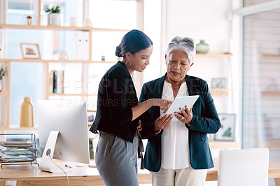 Buy stock photo Teamwork, mentor and business women with tablet for discussion, cooperation and planning. Technology, collaboration and senior manager with female analyst for advice, training and office coaching