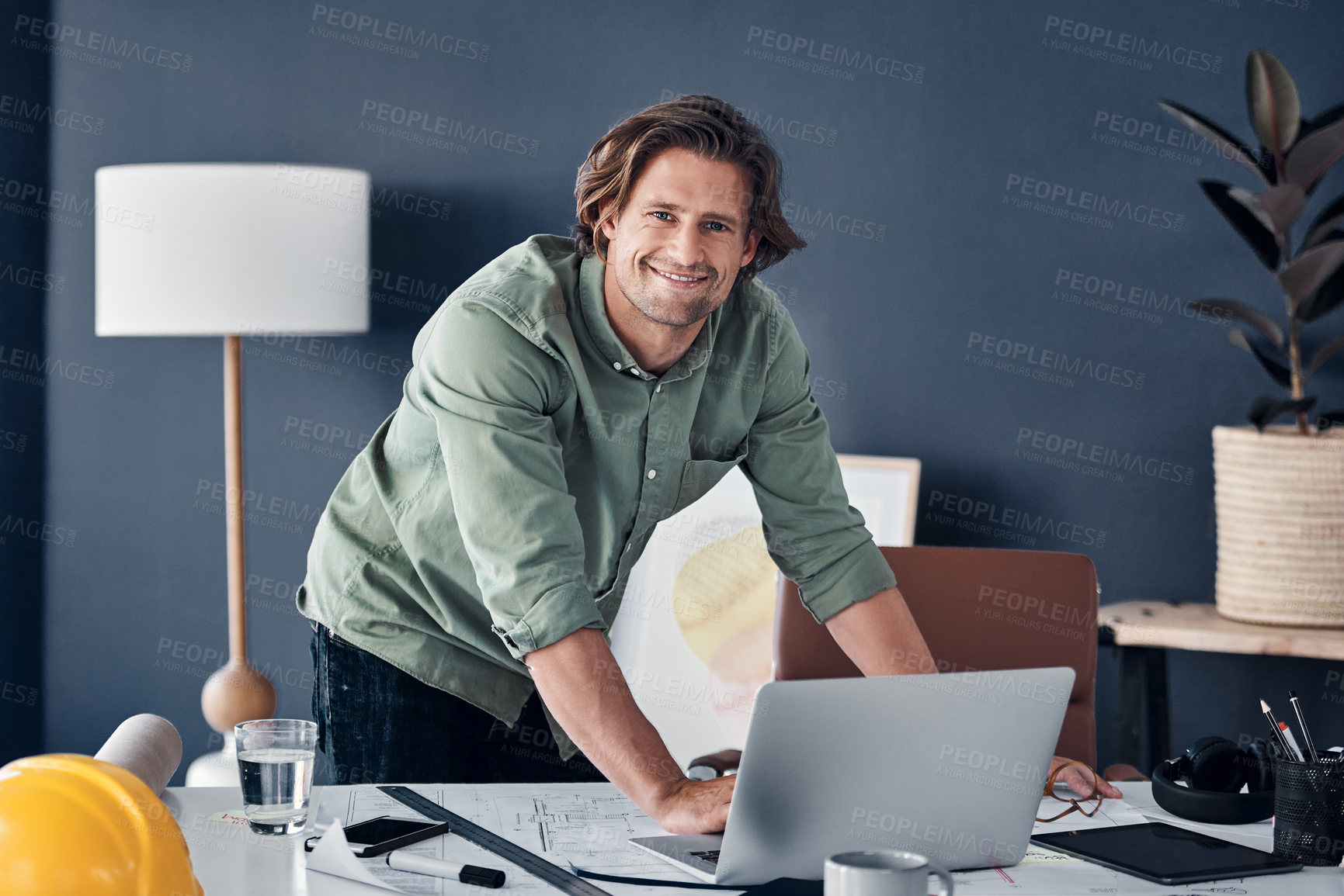 Buy stock photo Architecture, portrait and man with laptop, blueprint and smile for creative ideas in building development. Networking, internet and happy architect with computer, paperwork and floor plan in office