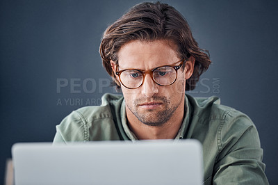 Buy stock photo Thinking, laptop and business man in office for working on web design, online project and planning. Creative startup, IT technician and person on computer for research, website and programming code