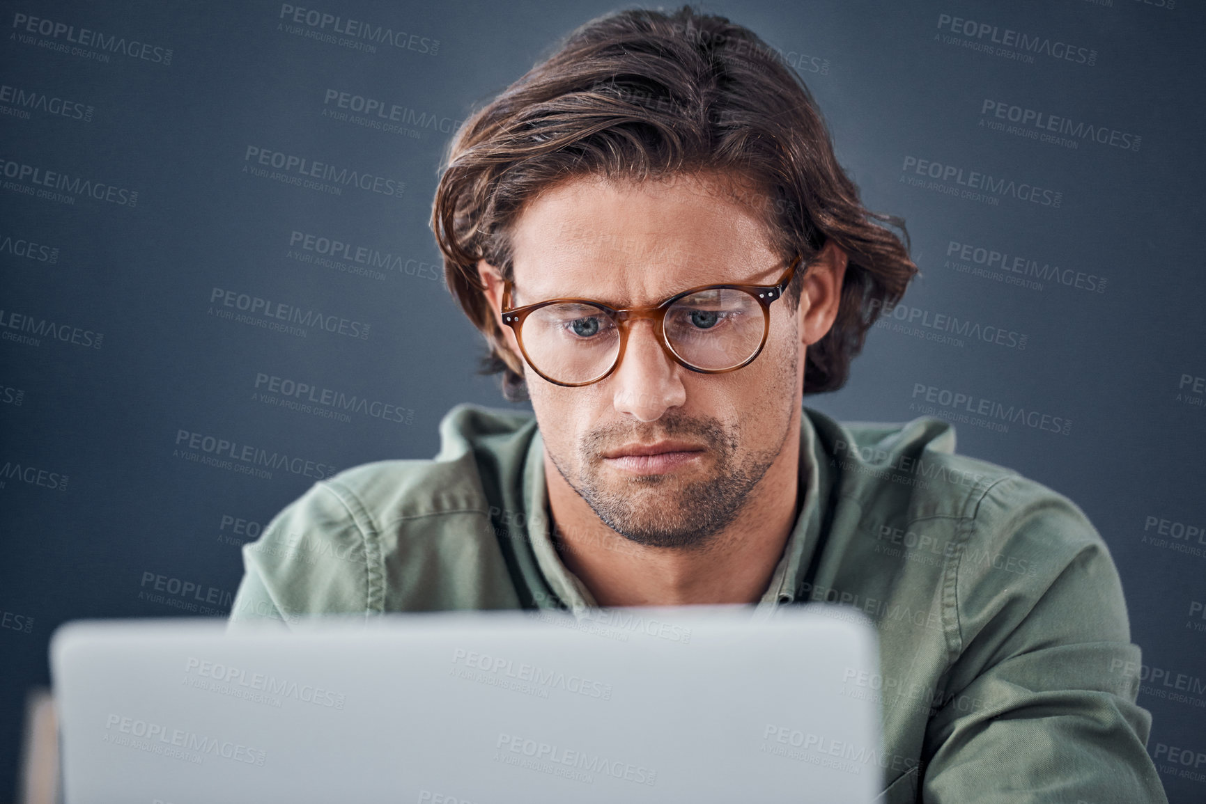 Buy stock photo Thinking, laptop and business man in office for working on web design, online project and planning. Creative startup, IT technician and person on computer for research, website and programming code