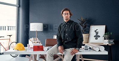 Buy stock photo Man, architect and serious in portrait at desk in office, professional contractor and pride in career. Civil engineering, architecture and employee, confident and creative with property development