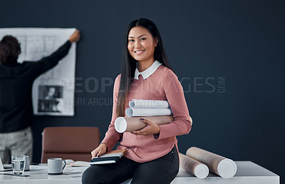 Buy stock photo Asian architect, woman and portrait with roll of sketch paper, documents or smile at small business. Person, property developer and happy for blueprint in construction, building or project in Jakarta