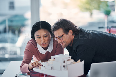 Buy stock photo Architect, people and modern house model for construction, teamwork and planning with review of prototype. Contractor, business meeting and renovation, collaboration with 3D design and development
